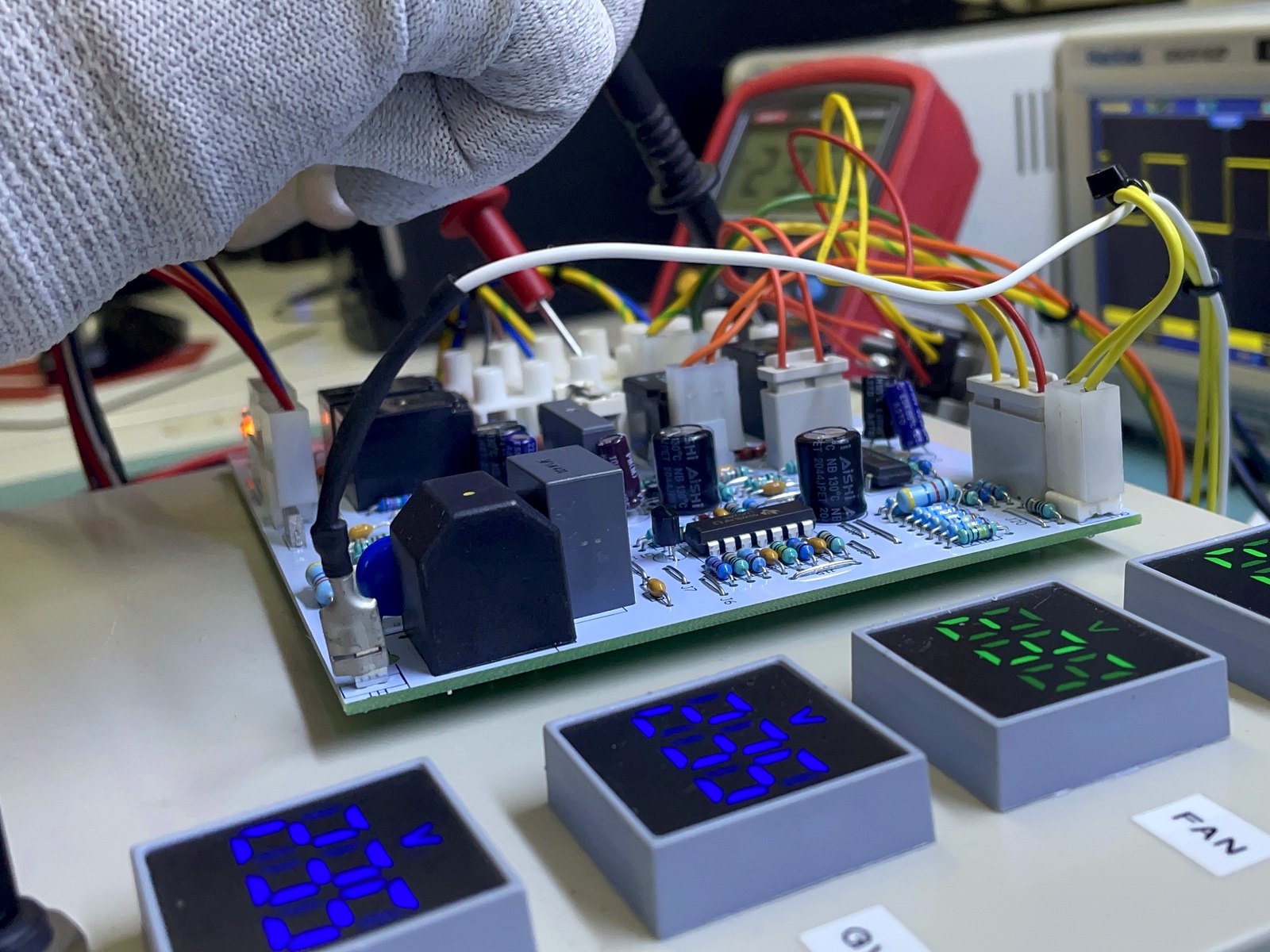 Reconditioned boiler PCB being tested on a test rig