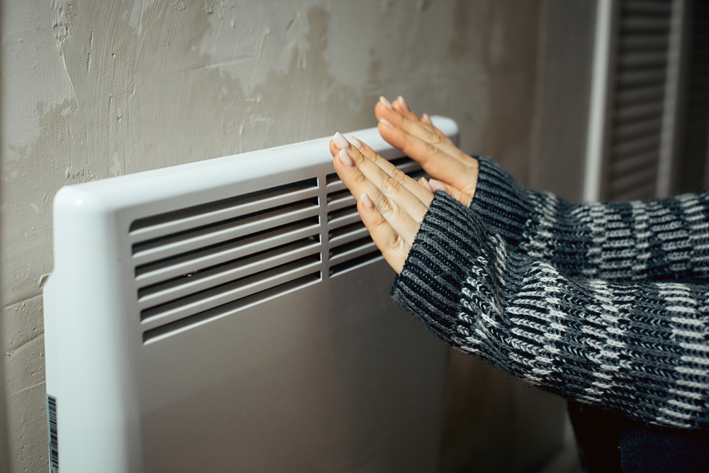 hands over radiator