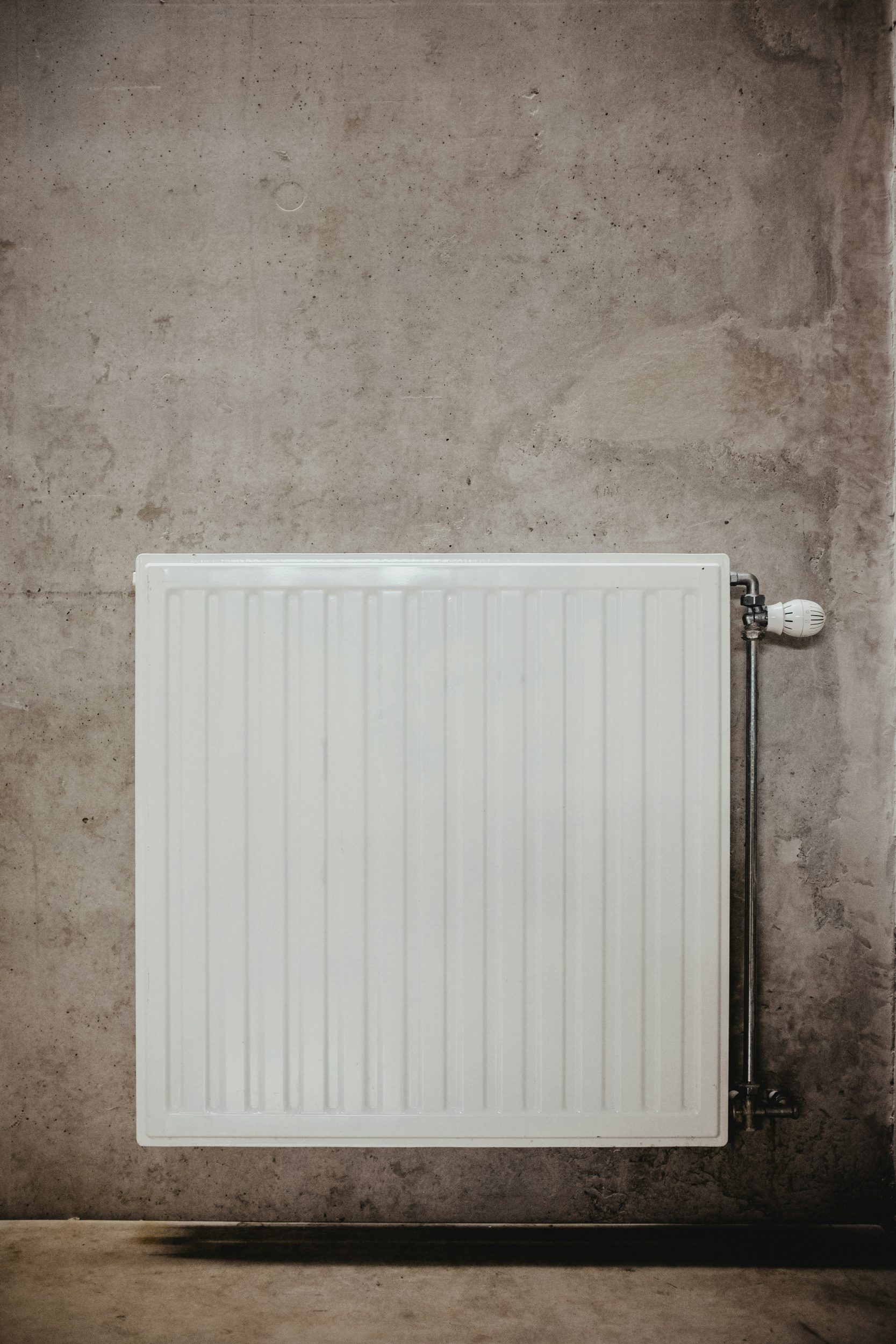 Radiator against the wall.